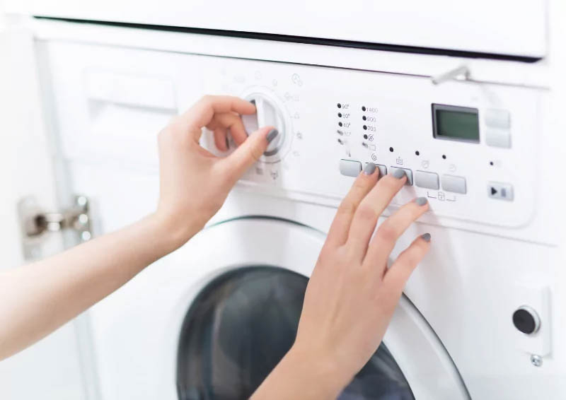 Cách làm quần áo nhanh khô bằng chế độ sấy của máy giặt