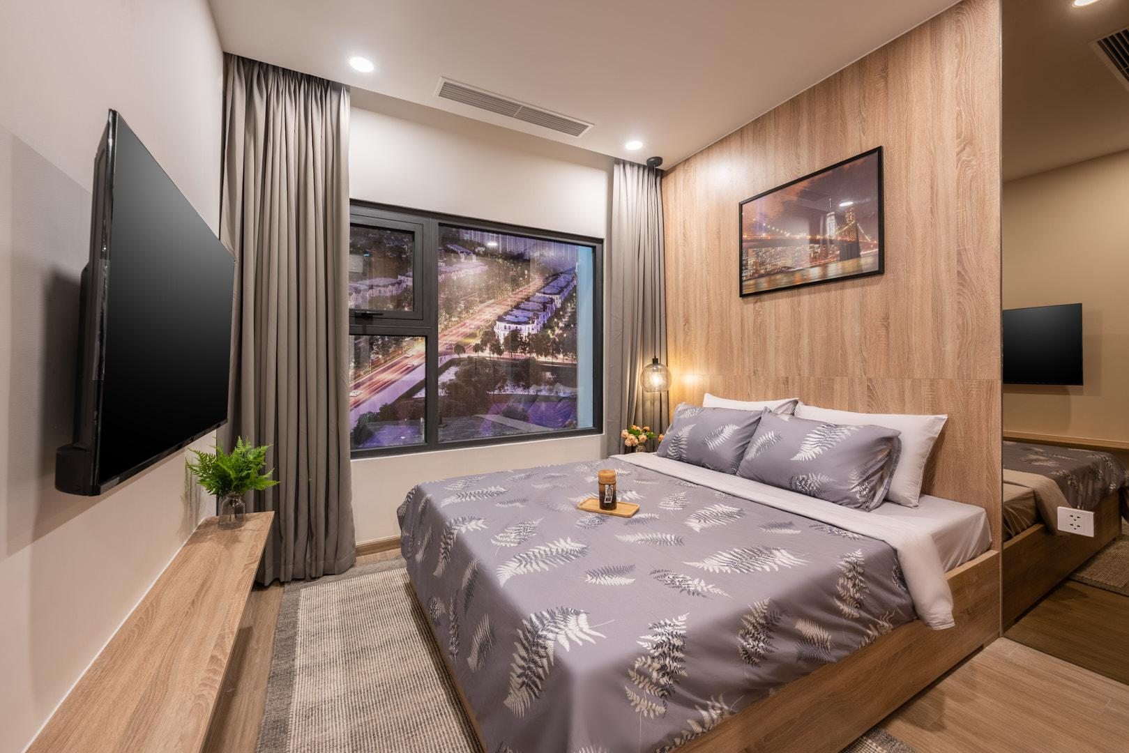 Phòng ngủ được thiết kế tối giản và tối ưu hóa không gian